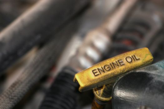 Engine oil dip stick on an automobile