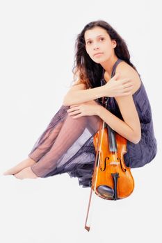 Violin player posing. Isolated over white background