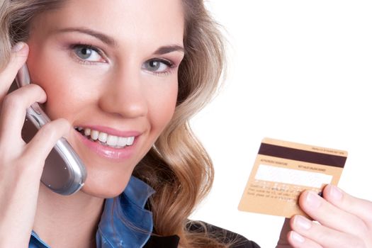 Smiling woman holding credit card