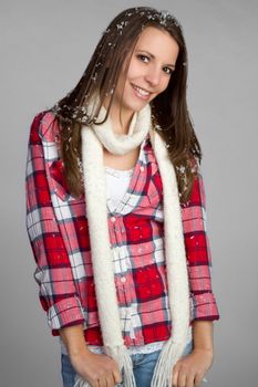 Pretty winter teen girl smiling