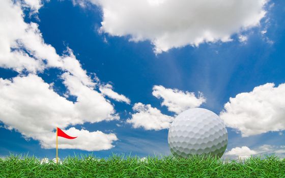 isolated golf ball on green grass field