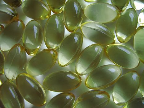 A photograph of pills detailing their shape.