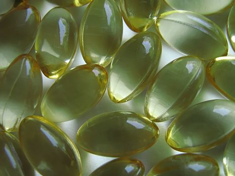 A photograph of pills detailing their shape.