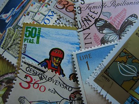 A photograph of various world postage stamps.