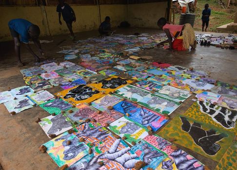 BWINDI PROVINCE, UGANDA, AFRICA 2008, DECEMBER  12: Children and drawings. The Orphanage in a province of Bwindi. Uganda. Children display the drawings for sale to tourists.  On December, 12th, 2008.