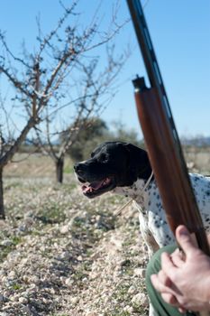 A hunter and his dog, a strong parntership