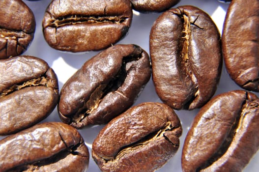 an image of brown coffee, background texture, close-up