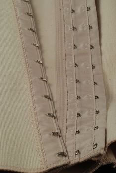 eyelets and hooks used in girdles and in corsets