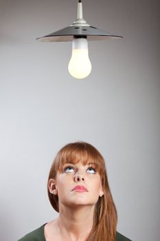 portrait of a young woman and a lamp