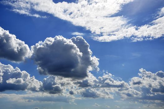 white clouds against blue sky