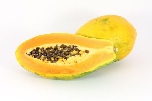 Ripe papaya fruit isolated on white background