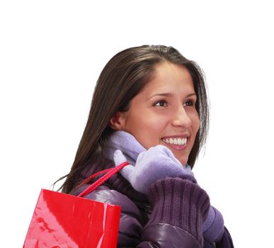 Portrait of a young woman with a shopping bag over her shoulder.