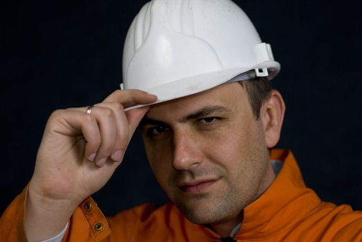 Miner saluting with his hardhat stock photo