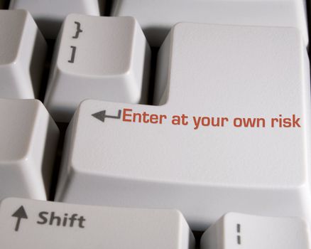 Computer enter or return key with the words Enter at your own risk