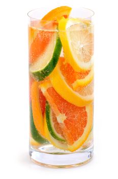 Bubbly beverage with citrus slices isolated on white background