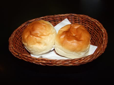 Two bread rolls in the basket