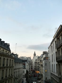Street at sunset in Paris France in the fall