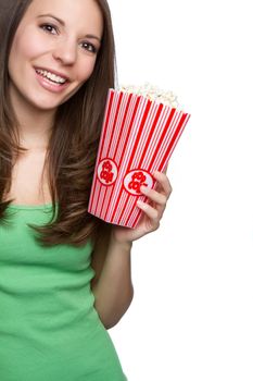 Smiling teenage girl eating popcorn