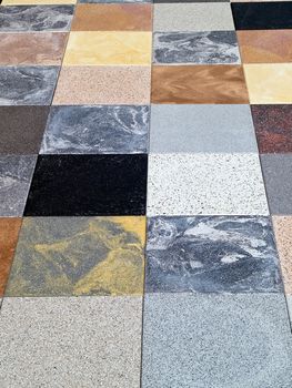 Display of different stone granite floor tiles for outdoors garden and indoors