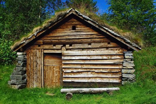 Ancient fisherman's  wooden hut  in ethnic park of Alesund, Norway