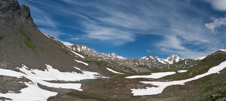 beautiful landscape from Pointe Rousse pass, Aosta valley, Italy with Mont Blanc massif on background