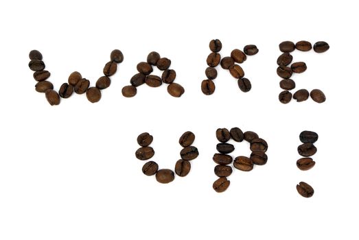 Phrase wake up written with coffee beans isolated on white