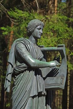 Statue of the muse of poetry in park of Pavlovsk, Saint-Petersburg, Russia