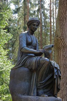 Statue of the muse of poetry in park of Pavlovsk, Saint-Petersburg, Russia