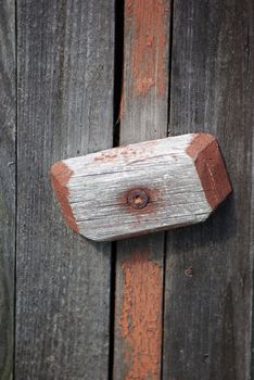 Old wethered wooden door fastener