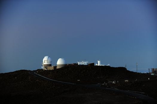 Astronomical observatory in mountains early in the morning.