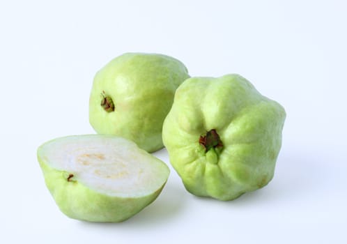 Fresh half of Guava fruit over white background