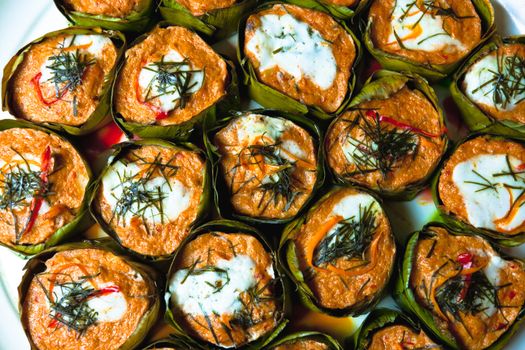 steamed fish curry in banana leaves