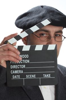 Old fashioned man looking through the movie clapper