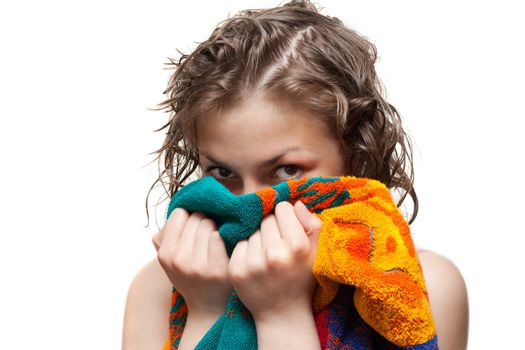 Making look younger girl with wet hair looks from for towel on white background