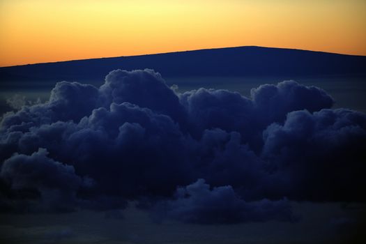 Volcano of Haleakala before a dawn. Volcano top over clouds before a dawn 