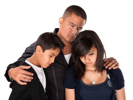 Hispanic father with kids looking down and sad on white background