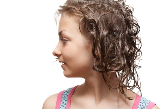 Beautiful girl with wet hair in profile