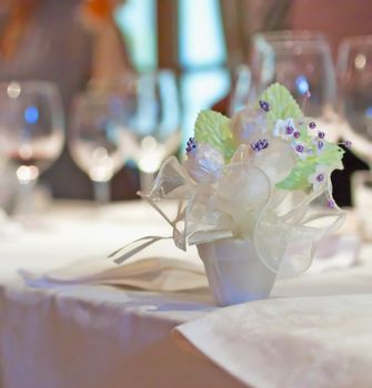 Close up of a bonbonniere over a table 