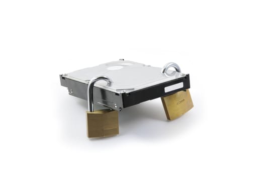 Hard disk back view with two locked padlocks on a white background