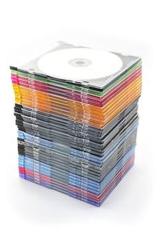 Multi-colored dvd slim box stacked on a white background