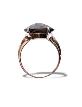 Gold ring with black precious stone isolated on white background. Clipping path is included 