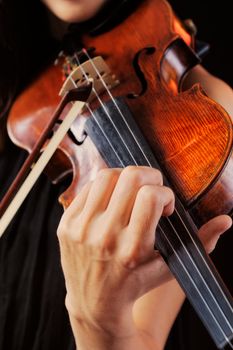Close-up of musician plays the violin