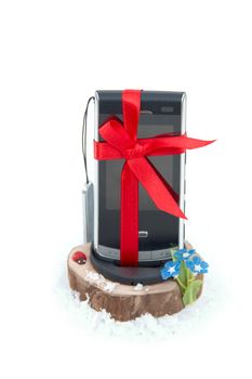 Mobile phone in a gift by a holiday