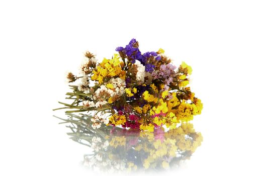 Bouquet of flowers laying horizontally on a white background
