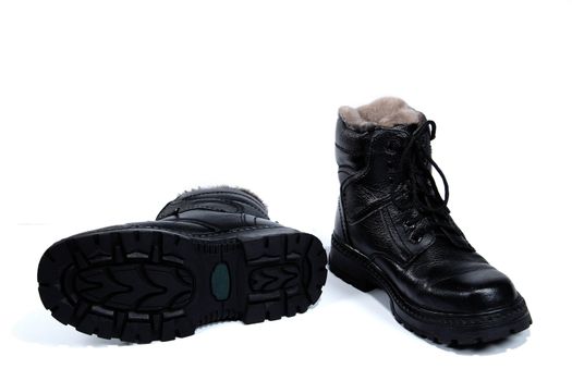 Black man's boots, on the white background, isolated