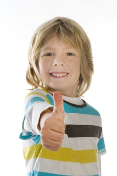 a young boy with his thumbs up