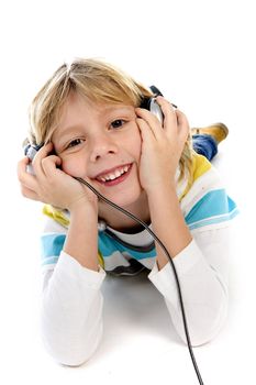 a boy listining to music with a headphone