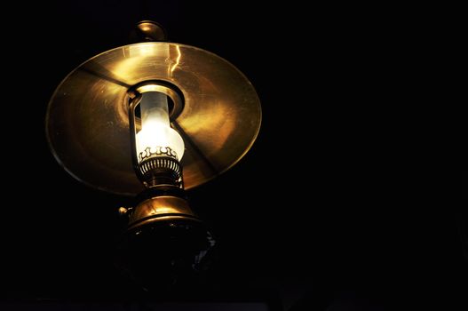 a antique lamp lightning in the dark