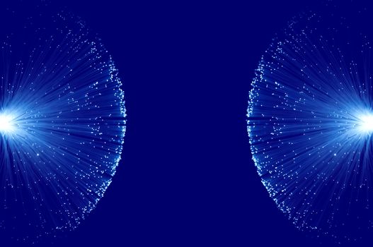 Two groups of illuminated blue fibre optic light strands eminating from the left and right image border against a blue background