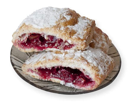 Strudel Puff pastry with apples and cherries, dusted with icing sugar